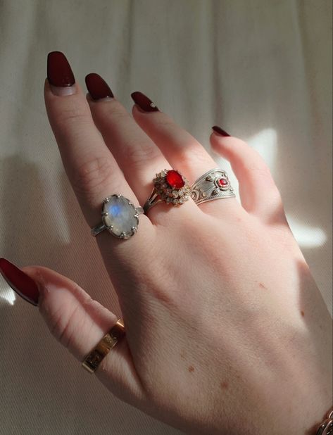 dark aesthetic vampire core. Dark red nails and red gemstone rings Vampire Rings Aesthetic, Dating A Vampire Aesthetic, Vampire Accessories Aesthetic, Vampire Fairy Aesthetic, Rich Vampire Aesthetic, 70s Vampire Aesthetic, Vampire Modern Aesthetic, Vampire Vibes Aesthetic, Vamp Birthday