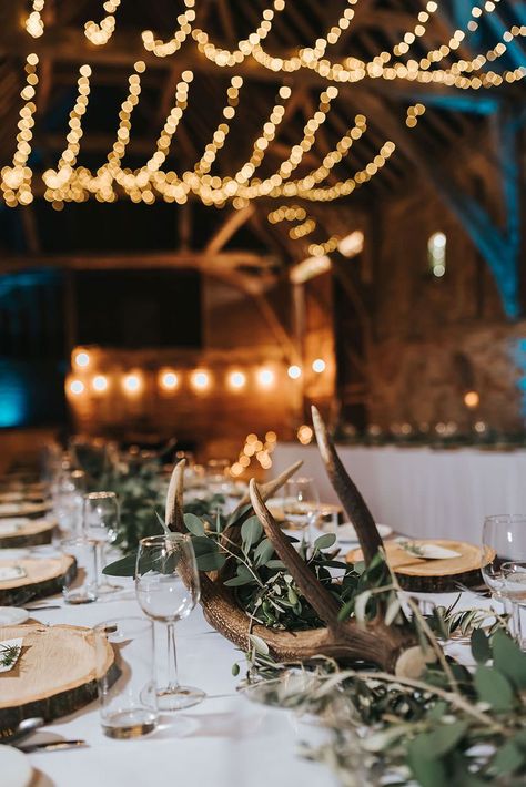 Rustic Barn Wedding at Helmingham Hall Gardens in Suffolk Antler Shed Wedding Decor, Antler Decoration Ideas, Wedding Decor With Antlers, Antler Wedding Decor, Monsoon Flower Girl Dress, Antler Centerpiece, Millennial Wedding, Mountain Wedding Decor, Deer Antler Wedding