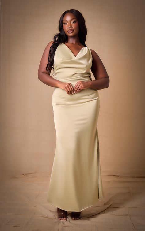 Create a look no one will forget with this dreamy plus sage bridesmaid satin cowl neck extreme maxi dress. With a sage hue satin material, a cowl neck design and a maxi length, this plus dress is her to bring all the luxe vibes. Just add heels and your fave accessories for a look that will earn you all the compliments.   Length approx 155cm/61 (Based on a sample size UK 16)   Model wears size UK 16/ EU 44/ AUS 16/ US 12 One Shoulder Sleeve Dress, Satin Gown Designs, Materials Gown Style, Bridesmaid Dresses Satin, Bridesmaid Satin, Chic Dress Classy, Champagne Bridesmaid Dresses, Elegant Bridesmaid Dresses, Bridesmaid Dress Styles