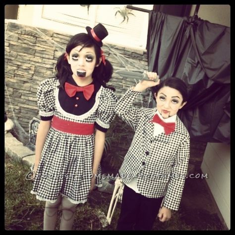 I make my kids their costumes every year. This year’s theme was something creepy and they decided on dolls and I got to thinking Ventriloquists!! They loved the idea and I went with it. They were both pretty easy. For her dress I used black and white gingham fabric and some lace and a big ... Read more The post Creepy Ventriloquist Doll Costumes appeared first on Coolest Homemade Costumes. Ventriloquist Doll Costume, Doll Costume Ideas, Slappy Costume, Scary Doll Costume, Raggedy Ann Costume, Diy Doll Costume, Ventriloquist Doll, Creepy Circus, Ventriloquist Dummy