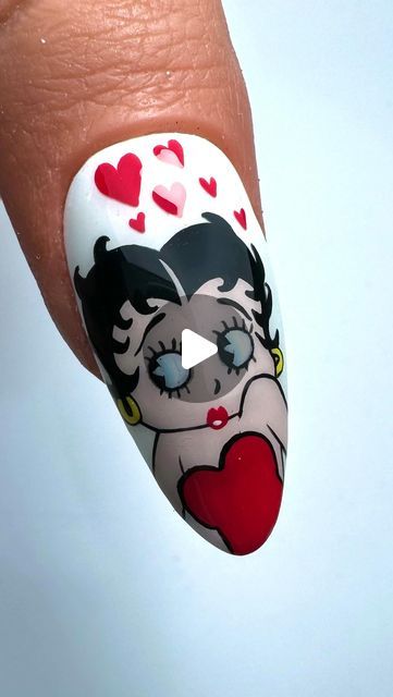 AMANDA BYRNE NAIL ARTIST on Instagram: "❤️ Betty Boop ❤️ Using #everythingmagpie ♥︎ PLAIN JANE Gel colour ♥︎ MAGPIE ARTYgels ♥︎ LIKE A DIAMOND ♥︎ PREMIUM DETAILER BRUSH 6 & 9 🖤 @magpie_beauty 🖤 @magpie_education 🖤 @aleana_hand Female Practice Thumb #nails #nailsonfleek #nailsofinstagram #instanails #nailswag #naildesigns #nailsoftheday #nailporn #gelnaildesign #gelnails #manicure #nailitdaily #nailprodigy #showscratch #magpiebeauty #bettyboopnails #bettyboop #valentines #magpiemonthlychallenge #valentinesnails #bettyboopnailart #handpaintednailart #nailarttutorial #nailtutorial #nailvideo #nailartvideo #boltonnails #boltonnailtech @nails_by_steps @mknogti_video @scratchmagazine @pblmagazine @pro_beauty01 @asos @asos_faceandbody @nailitmedia" Betty Boop Nail Art Step By Step, Hand Painting Nail Art, Valentine's Nail Ideas, Brushing Nail Art Designs, Brush Art Nails, Betty Boop Nails Designs, Betty Boop Nail Art, Cartoon Art Nails, Nail Brush Art