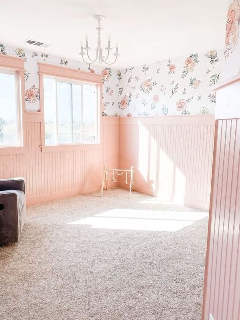 Girl's Nursery Makeover Pt.1Pink Bead Board I've done my fair share of board/batten projects with my husband, Scott, by now but we have yet to work with beadboard and I really wanted this room to feel very feminine and feel like a room you would see in a victorian/craftsman home 100 years ago (but a little more modern). We just finished up a boy's room makeover for our son's who are now sharing a room, this was our youngest sons nursery, and that room has a dark green board/batten t… Board And Batten Nursery With Wallpaper, Bead Board In Nursery, Wallpaper And Beadboard Nursery, Beadboard Girls Bedroom, Kids Room Beadboard, Bead Board With Wallpaper, Wainscoting Girls Bedroom, Board And Batten Wall Girls Room, Girls Room Wainscoting