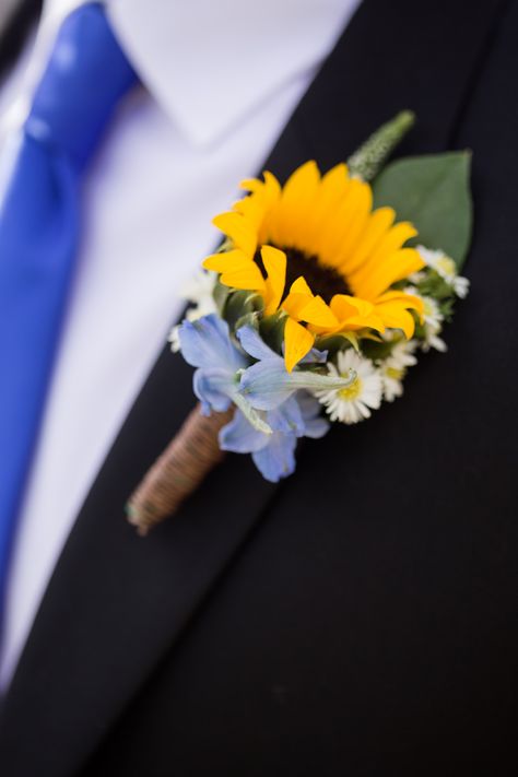 Sunflower for a spring wedding! #SunflowerBoutonnieres #PetalandBean #MountainWeddings #SpringWeddings Sunflower Boutineer Ideas, Navy Blue And Sunflower Wedding Theme, Sunflower And Blue Wedding Theme, Light Blue Sunflower Wedding, Sunflower And Blue Wedding, Steel Blue And Sunflower Wedding, Sunflower Wedding Flowers, Dusty Blue And Sunflower Fall Wedding, Dusty Blue And Sunflower Wedding Cake