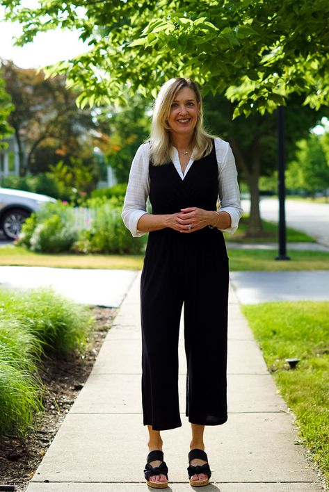 3 Ways to Wear a Black Jumpsuit Closed Toe Shoe With Jumpsuit, Black Sleeveless Jumpsuit Outfit, Styling Black Jumpsuit, Romper With Shirt Underneath, How To Style Black Jumpsuit, Jumpsuit With Tshirt, Jumpsuit With Shirt Underneath, Styling A Black Jumpsuit, How To Style A Black Jumpsuit