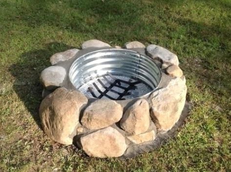 This Galvanized Round Fire Pit Ring is built-to-last durable and makes a simple, yet elegant centerpiece for your backyard or outdoor setting. 30 in. D the deep pit of this-Piece is certain to keep your guests warm and toasty on even the chilliest of nights. Designed to complement other offerings from Dewan and Sons with a galvanized finish, the fire ring includes 4-Pieces that require minor assembly. Easily stored and portable, so you can take the warmth with you wherever you roam. Durable galv Steel Fire Pit Ring, Fire Pit With Rocks, Sunken Fire Pits, Fire Pit Ideas, Fire Pit Ring, Fire Pit Landscaping, Cool Fire Pits, Round Fire Pit, Portable Fire Pits