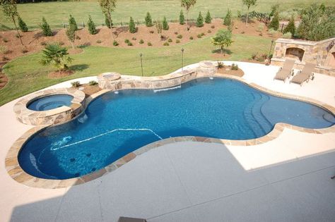 Freeform Pools: Design Ideas, Pros/Cons & More - Pool Research Rectangle Vs Freeform Pool, Odd Shaped Pools, Freeform Pool With Spa, In Ground Pool Ideas, Fiberglass Pool Ideas, Free Form Pools, Freeform Pool Designs, Yard Renovation, Patio Paradise