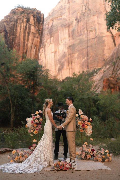 Zion National Park Wedding Photography | Bridal bouquet ideas | Destination Wedding Planner. Imagine celebrating your love against the breathtaking backdrop of Zion National Park's towering red sandstone cliffs. Find zion national park wedding photography, national park elopement, classy elegant wedding dress tight and elopement in national park. Book us to plan your unforgettable destination wedding at emberandstoneevents.com. Zion National Park Wedding, Green Fall Weddings, Bridal Bouquet Ideas, Mountain View Weddings, Luxury Elopement, Zion Utah, Small Weddings Ceremony, Outdoor Luxury, Boho Elopement