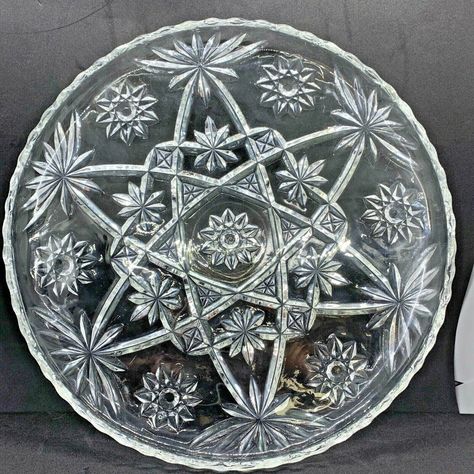 "Anchor Hocking has always created wonderful, practical serveware that has helped millions of households over the years. This vintage Star of David serving platter, is no different! Sawtooth rim, fine cut glass, and one of the most popular designs made by AH! This platter has seen some use; as you will see in the photos-- just a couple spots over the years. It is a beautiful piece, with just a couple of surface scratches, but no chips, breaks, cracks or crazing in the crystal. Please see the photos for more details. The platter measures 13.5\" inches in diameter" Antique Dishes Collectible, Crystal Glassware Antiques, Vintage Pyrex Patterns, Vintage Dishes Antiques, Vintage Kitchen Accessories, Pyrex Patterns, Vintage Glassware Antiques, Vintage Jewelry Antique, Vintage Dishware