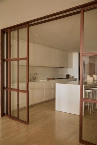 Zara Home Sofa, Kitchen Glass Door Design, Kitchen Sliding Doors, Concrete Stool, Partition Door, Housing Ideas, Misha Nonoo, Loft Kitchen, Miami Houses