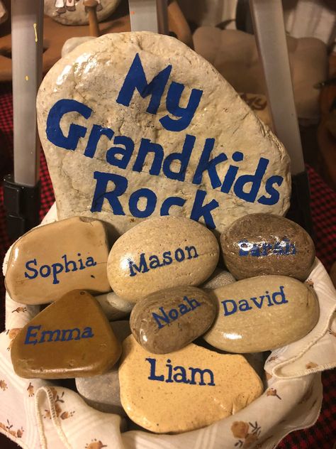 Hand painted, custom designed rocks.  Can be personalized to perfectly suit your needs (kids, grandkids, nieces, nephews, friends, family, etc) Pricing includes main rock with two name rocks for $30, and $2-3 per additional name rock. Sealed for outdoor or indoor use.  Please allow up to 7 business days for delivery. Family Rocks, Neat Gift Ideas, Kids Treat, Painting Words, Painted Rocks Craft, Rock Decor, Cool Rocks, Kid Rock, Garden Painting