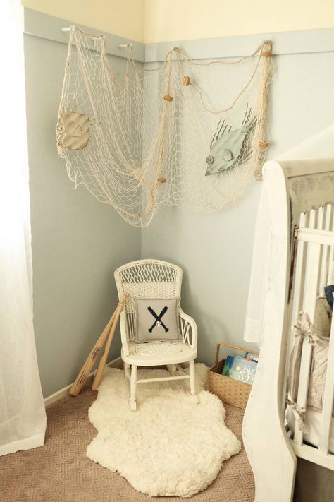 Fish netting decor compliments of hobby lobby, boys baseball nursery decor from pottery barn Fish Net Decor Bedroom, Fishing Themed Nursery Boys, Fishing Nursery Ideas, Fisherman Nursery Theme, Fishing Nursery Boy, Lobster Nursery, Lake Themed Nursery, Fisherman Nursery, Baby Boy Fishing Nursery