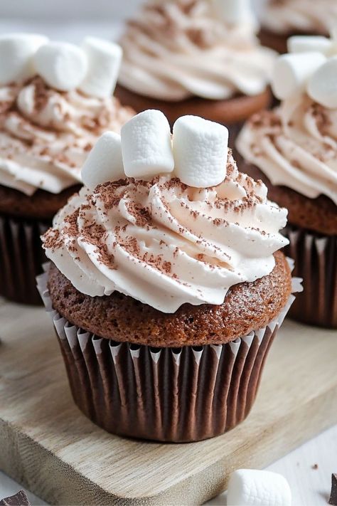 Hot Chocolate Cupcakes are a delightful twist on your traditional cupcake, combining the rich flavors of hot cocoa into a moist. Cute Chocolate Cupcakes, Hot Coco Cupcakes Recipe, Aesthetic Christmas Cupcakes, Hot Cocoa Muffins, Christmas Chocolate Cupcakes, Chocolate Cupcakes With Filling, Hot Chocolate Cupcakes Recipe, Chocolate Christmas Cupcakes, Holiday Cupcakes Christmas