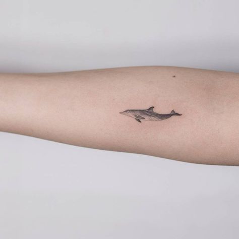 Fine line dolphin tattoo on the right inner forearm. Dolphin Tattoos, Dolphin Tattoo, Dolphins Tattoo, Inner Forearm Tattoo, Ocean Tattoos, Shark Tattoos, Tattoo Black, Dainty Tattoos, Tattoo Designs And Meanings