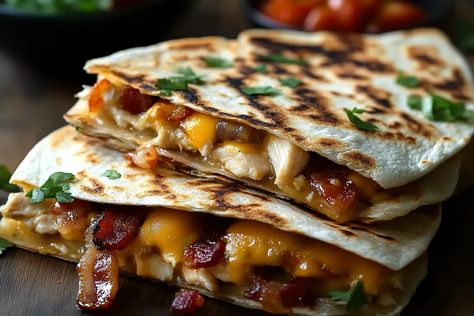 Chicken Bacon Ranch Quesadilla: A quick, cheesy, and crispy recipe with chicken, bacon, ranch, and gooey cheese. Bacon Ranch Chicken Quesadillas, Chicken And Bacon Quesadillas, Chilis Chicken Bacon Ranch Quesadillas, Chicken Bacon Ranch Quesadilla Recipe, Chicken Bacon Ranch Quesadilla, Bacon Ranch Quesadilla, Recipe With Chicken, Crispy Recipes, Quesadilla Recipes