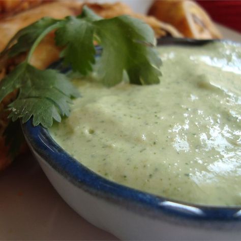 Amy's Cilantro Cream Sauce | "Cream cheese, cilantro and spices. How can you go wrong?" Cilantro Cream Sauce, Pollo Tropical, Tomatillo Sauce, Cream Sauce Recipes, Cilantro Sauce, Green Sauce, Fish Tacos, Cream Sauce, Dip Recipes