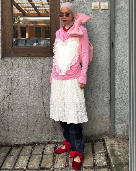 saturday is fooooorrr dress down kinda daaay! simple layering it is but still keep it cute with pink-ribbon-laces combo 🩷🤍 happy saturday! . . . . . . . . . lace outfit. pink outfit. coquette style. skirt over pants. medium skirt. red ribbon. red shoes. bow tie bag. pink bag. layering style. casual outfit. outfit repeater. outfit rotation. #ootd #fashion #styleinspo Tshirt Layering Outfit, Tshirt Layering, Skirt Over Pants, Outfit Rotation, Outfit Repeater, Outfit Coquette, Layering Style, Medium Skirt, Ribbon Laces