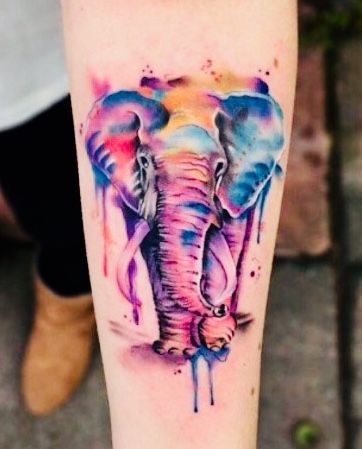 WATERCOLOR ELEPHANT TATTOO ON ARM Big Elephant Tattoo, Cute Mermaid Tattoo, Elephant Tattoo Design For Women, Hindi Tattoos, Watercolor Tattoo Music, Watercolor Elephants, Colorful Elephant Tattoo, Watercolor Tattoo Sleeve, Cute Elephant Tattoo