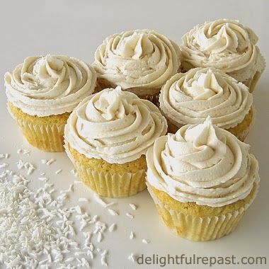 Coconut Cupcakes / www.delightfulrepast.com Rum Buttercream Frosting, Rum Buttercream, Rum Desserts, Small Batch Cupcakes, Coconut Cupcake Recipes, Rum Cupcakes, Coconut Buttercream, Coconut Icing, Small Batch Baking