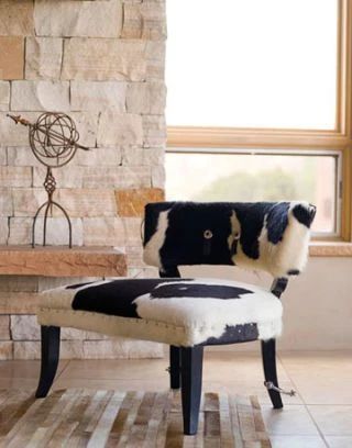 4 Takes on Modern Southwestern Style | Vesper and Vine Cow Print Chair, Santa Fe Style Homes, Cowhide Decor, Cowhide Chair, Modern Southwestern, Cowhide Furniture, Santa Fe Home, House Beautiful Magazine, Southwestern Home