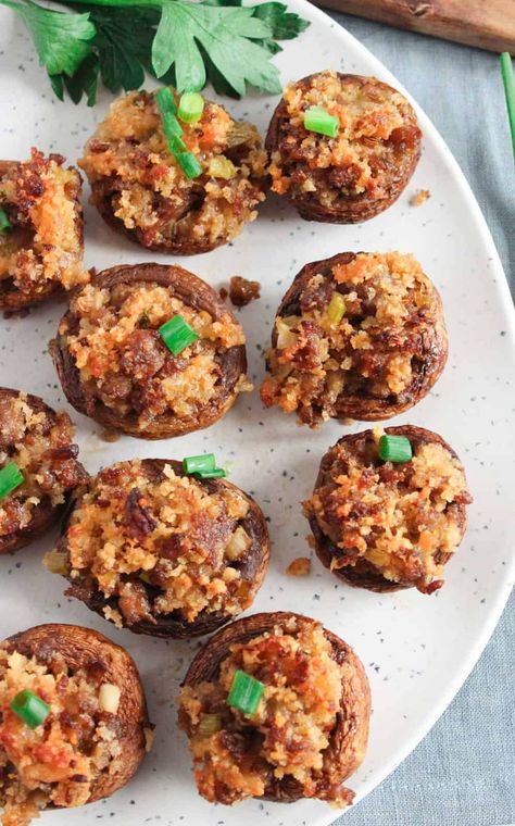 Italian stuffed mushrooms are filled with a delightful mix of sweet Italian sausage, breadcrumbs, herbs, and creamy cheese, all baked to crispy perfection. Stuffing Stuffed Mushrooms, Stuffed Mushrooms With Cheese, Mushrooms With Cheese, Italian Stuffed Mushrooms, Stovetop Stuffing, Thanksgiving Spread, Thanksgiving Appetizer, Cheese Stuffed Mushrooms, Stuffed Mushroom