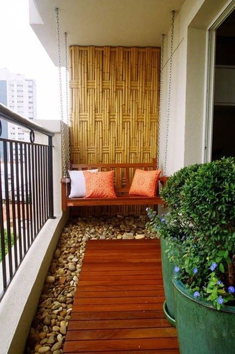 Bamboo inspired walls aren’t only great to look at but they also help make your surroundings seem fresh and cool. Add smooth white pebbles as your carpet and potted plants and you will be feeling the cool fresh air blowing straight from your balcony. Klein Balkon Decor, Balcon Mic, Condo Balcony, Balkon Decor, Balcony Design Ideas, Tiny Balcony, Balcony Flooring, Small Balcony Garden, Small Balcony Design