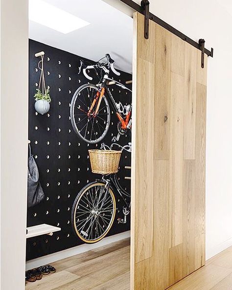 Mud Room | Sliding Barn Door and Peg Board Storage Bike Storage Apartment, Indoor Bike Storage, Bike Storage Solutions, Contemporary Barn, Bike Room, 아파트 인테리어, Architecture Design Concept, Bike Storage, Gray Interior