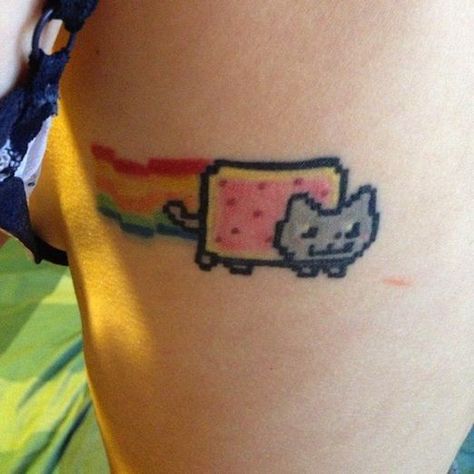 Nyan Cat Tattoo, Wasted Tattoo, Scene Tattoo Ideas, Domo Tattoo, Fluttershy Tattoo, Weirdcore Tattoo, Cutie Mark Tattoo, Scene Tattoos, Silly Tattoos