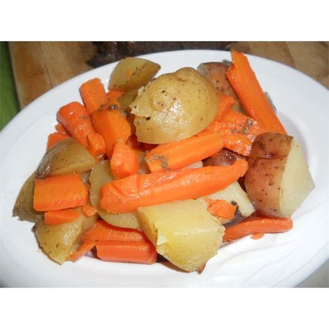 Potatoes and Carrots Boiled Carrots And Potatoes, Boiled Cabbage Potatoes And Carrots, Boiled Potatoes And Carrots, Roast Potatoes And Carrots, Garlic Plant, Campfire Potatoes, Carrots In Oven, Best Potatoes, Roasted Potatoes And Carrots