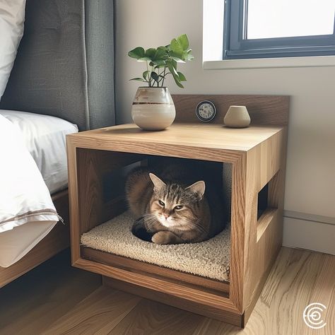 The Cat Scratching Post Bedside Table combines functionality and style. Featuring a built-in scratching post inside the table, it offers a discreet and durable solution for your cat’s scratching needs. The tabletop is perfect for holding a lamp, books, or other essentials, seamlessly fitting into any bedroom decor while keeping your cat entertained and your furniture protected. Conceptual AI Art Follow @ecosapiens for more! Cat Furniture Design, Cat House Diy, Cat Home, Top Furniture, Cat Things, Cat Ideas, Cat Scratching Post, Furniture Trends, Cat Room