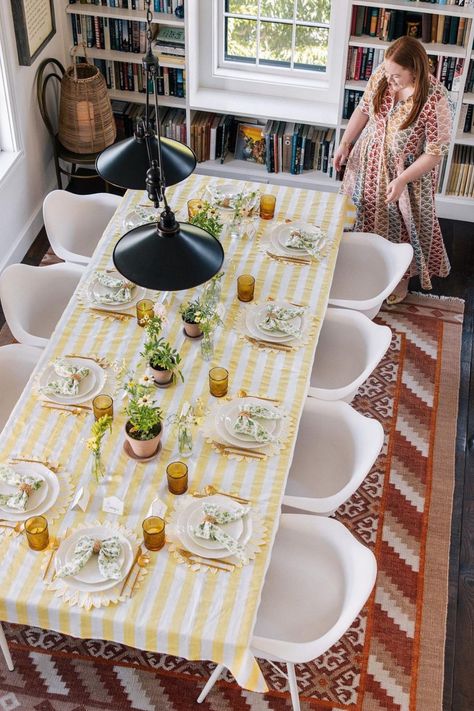 Get inspired for your next apartment dinner party with this yellow floral and stripe table decor including amber glasses, white plates, floral napkins and floral centerpieces. Follow prêt-à-provost for more feminine party hosting inspiration. (includes affiliate links) Nyc Dinner Party, Apartment Dinner Party, Chic Tablescape, Nyc Dinner, Yellow Tablecloth, Yellow Plates, Floral Napkins, Striped Table, Classic Home Decor