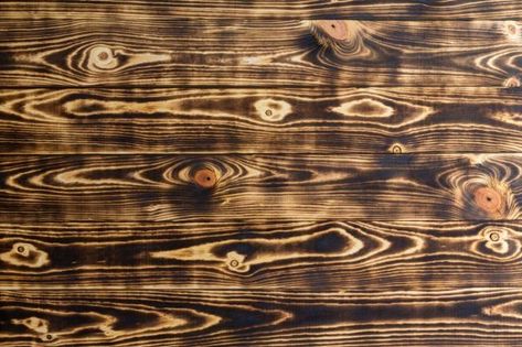 Try a Burnt Wood Finish on Your Next Project Burnt Wood Finish, Poolside Lounge Chairs, Accent Wall Panels, Grey Stained Wood, Burned Wood, Bob Vila, Burnt Wood, Beginner Woodworking Projects, Wood Panel Walls