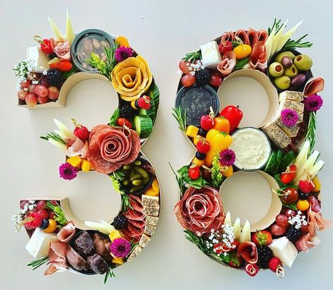 Of course, if your board is for an occasion such as an important birthday or anniversary, you could get very creative with number-shaped charcuterie! Cardboard Numbers Charcuterie, Number Box Charcuterie, Number Snack Board, Numbers Charcuterie Board, Number Shaped Charcuterie Board, 2024 Charcuterie Board Numbers, Happy Birthday Charcuterie Board, Charcuterie Number Board, Number Charcuterie Board