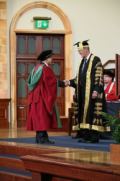 From Wikiwand: A new PhD graduate from the University of Birmingham, wearing a doctor's bonnet, shakes hands with the Chancellor Phd Graduate, Canadian Universities, Phd Graduation, Science Writing, University Of Birmingham, Doctorate Degree, Phd Student, Medicine Doctor, Academic Achievement