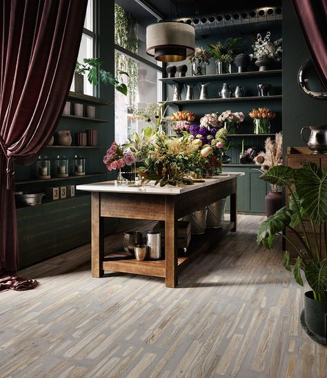 Porcelain tile that mimics the look of combined wood planks and cement that is featured on the floor of a flower shop Florist Shop Interior, Flower Shop Interiors, Florist Studio, Flower Shop Decor, Flower Shop Design, Flower Store, Florist Shop, Flower Studio, Floral Studio