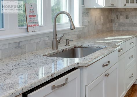 This kitchen remodel by Showplace was designed by Cathy from our Nashua showroom. This kitchen was built new by one of Cathy’s builders in Hudson, NH. The homeowner was fully decorated for the holidays, including collectible Santa statues that she had collected over the years! Cabinets: Showplace Concord SP Finish: White Paint Counter tops: Granite Color: Galaxy White The kitchen design [...] Kitchen Granite Ideas, White Galaxy Granite, Kitchen Hatch, Stacked Cabinets, White Granite Countertops Kitchen, Light Granite Countertops, Cheap Kitchen Countertops, White Subway Tile Kitchen, White Granite Kitchen