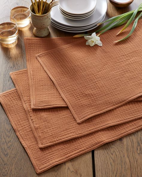 Made from 100% organic cotton, these placemats are not only eco-friendly but also incredibly soft and gentle to the touch. The natural texture of the gauze fabric adds a unique touch to your table setting, and the simple yet elegant design complements any style of dishware. These placemats are also versatile, perfect for use at any meal or occasion, from casual picnics to formal dinners. With their durable construction, these placemats are designed to last, so you can enjoy them for years to com Muslin Table Runner, Japandi Table Setting, Placemat Photography, Placemats Ideas Dining Rooms, Organic Table Setting, Neutral Placemats, Simple Placemats, Easy Placemats, Modern Placemats