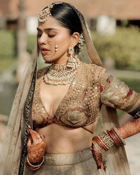 Not everyone can pull off a beige lehenga and rock the look. The bride of the week, Tanvi Singh donned a beige-colored lehenga, designed by Sabyasachi Mukherjee, and looked extremely graceful🤎🤍 Bride: @tanvisiingh28 Outfit: @bridesofsabyasachi @sabyasachiofficial Photography: @fourfoldpictures #sabyasachi #sabyasachibride #bride #bridaloutfit #brideoftheday #brideoftheweek #bridalmakeup #bridalwear #bridemakeup #bride2024 Sabyasachi Blouse Back, Sabyasachi Blouse, Beige Lehenga, Sabyasachi Lehenga Bridal, Sabyasachi Mukherjee, Sabyasachi Bride, Sabyasachi Lehenga, Lehenga Bridal, Blouse Designer