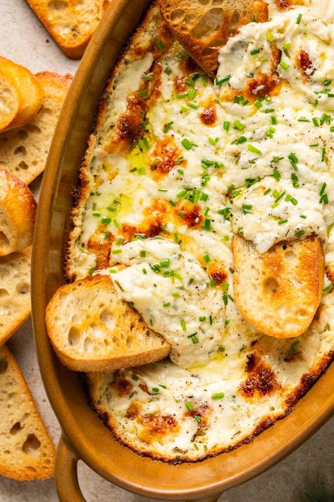 An easy, game day favorite, this garlic bread dip is all of the taste and flavor of your favorite cheesy garlic bread, in dip form! Serve with warm crusty bread, raw veggies, or crackers and enjoy this creamy, savory appetizer! Garlic Bread Dip, Bread Dips Recipes, Cream Cheese Recipes Dip, Queso Dip Recipes, Delicious Dips Recipes, Cheesy Dip, Handheld Mixer, Garlic Dip, Chicken Salads