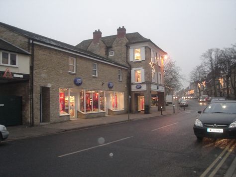 Witney is a town on the River Windrush, 12 miles (19 km) west of Oxford in Oxfordshire, England.  The place-name "Witney" is first attested in a Saxon charter of 969 as "Wyttannige"; it appears as "Witenie" in the Domesday Book of 1086. The name means "Witta's island" Photo of Witney High Street, by Lilian Constable - Pictures of England Royalty Free Stock Photos Witney Oxfordshire, Pictures Of England, Domesday Book, Oxfordshire England, A Town, Place Names, History Facts, Free Stock Photos, Royalty Free Stock Photos