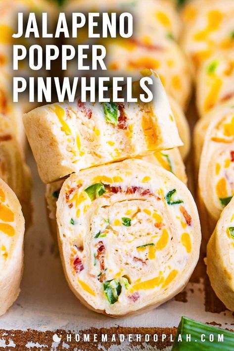 Jalapeno Popper Pinwheels! Jalapeno popper pinwheels meld creamy cheese, crispy bacon, and spicy jalapeno, delivering an unforgettable flavor burst that's ideal for any special occasion. | HomemadeHooplah.com Jalapeno Popper Pinwheels, Pickle Wrap Dip, How To Make Pinwheels, Cream Cheese Pinwheels, Pinwheel Sandwiches, Tailgate Snacks, Pinwheel Appetizers, Cheese Pinwheels, Pinwheel Recipes