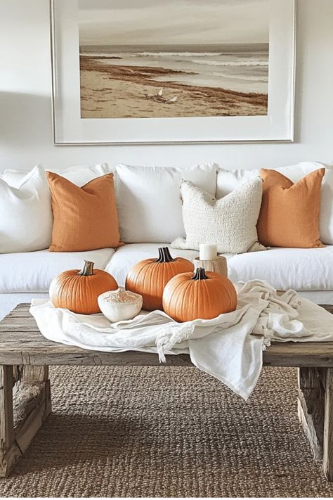 Fall in love with Rustic Coastal decor this autumn!  Discover how to create a warm, inviting space that combines the best of beach and farmhouse styles. Get all the details in our latest blog post! Some of the links in my articles are affiliate links. If you make a qualified purchase from one of my links I will make a small commission at no cost to you. Thank you for your support!!! Fall Coastal Decor, Warm Fall Decor, Backyard Firepit Area, Rustic Coastal Decor, Coastal Fall, Driftwood Lamp, Rustic Pumpkin, Cozy Fall Decor, Rustic Coastal