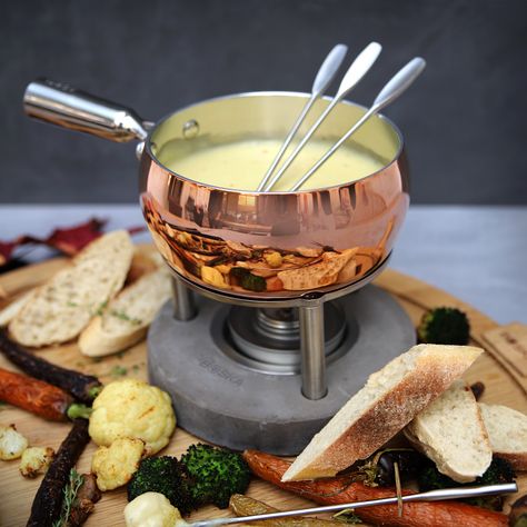 Recipe time! How about this Spicy Farmer's Cheese Fondue. With whom would you like to share it? You can find the recipe here: . Ingredients 300 gram of farmhouse cheese 400 gram of Gruyère 1 clove of garlic 300 ml of Chardonnay 1 splash of lemon juice 1 small glass of sherry 1 teaspoon of cornstarch Freshly ground chili flakes . Serving suggestions Baguette carrots (roasted),edible mushrooms (roasted),broccoli (roasted),cauliflower (roasted) . Preparation You can find the recipe on our website! Cheese Curls, Fondue Forks, Copper Christmas, Food Tool, Fondue Recipes, Fondue Pot, White Pot, Fondue Set, Tableware Design