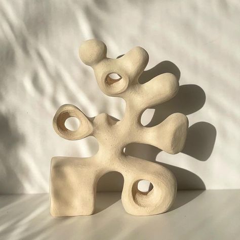 Carmelina | Ceramicist on Instagram: "The Oompa Loompa Sculpture 🤍 Love the White raku abstract sculpture with the organic finish🤍 H/36cm W/28cm #ceramics #pottery #sculptureabstract #sculpture #art #abstractart #oneofakind #unique #homedecor #decorhomestyle #interiordesign #interiorstyling #unglazedceramics #unglazed" Ceramics Abstract Sculpture, Abstract Ceramics Pottery, Subtractive Clay Sculpture, Clay Sculpture Art Project Ideas, Abstract Pottery Sculpture, Abstract Clay Sculpture Ideas, 3d Sculpture Art, Ceramics Ideas Sculpture, Organic Sculpture Abstract