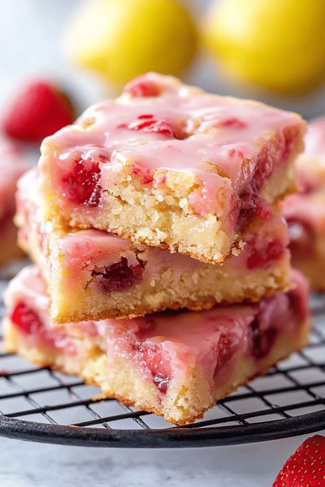 Strawberry Lemon Blondies are a delicious treat that beautifully balances the sweetness of strawberries with the zesty brightness of lemons. These soft, chewy bars are ideal for any occasion! Unlike cookies, bars and brownies are quicker to make and are the perfect dessert to bring to gatherings. This Strawberry Lemon Blondie recipe is bursting with Strawberry Lemon Blondes, Strawberry Lemon Bars Recipes, Strawberry Lemon Brownies, Lemon Strawberry Cookies, Strawberry Lemon Bars, Strawberry Lemon Blondies, Strawberry Blondies, Lemon Blondies, Chewy Bars