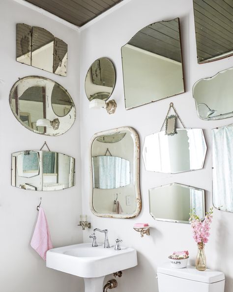 The five members of the Pata family successfully share a single bathroom—a Jack and Jill that sits between the children's rooms. A collection of vintage mirrors makes the bathroom appear larger. Vintage Bathroom Mirrors, Decorative Bathroom Mirrors, Mirror Gallery, Mirror Gallery Wall, Vintage Mirror Wall, Vintage Mirrors, Vintage Bathrooms, Small Bathrooms, Simple Bathroom