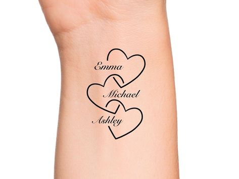 This Tattooing item by LunaAndRoseStudio has 93 favourites from Etsy shoppers. Is dispatched from United States. Listed on 04 Sep, 2024 Grandbaby Tattoo Ideas, Mama Tattoos, Wörter Tattoos, Hearts Tattoo, Infinity Tattoo Designs, Tiny Wrist Tattoos, Cool Wrist Tattoos, Tattoos With Kids Names, Mommy Tattoos