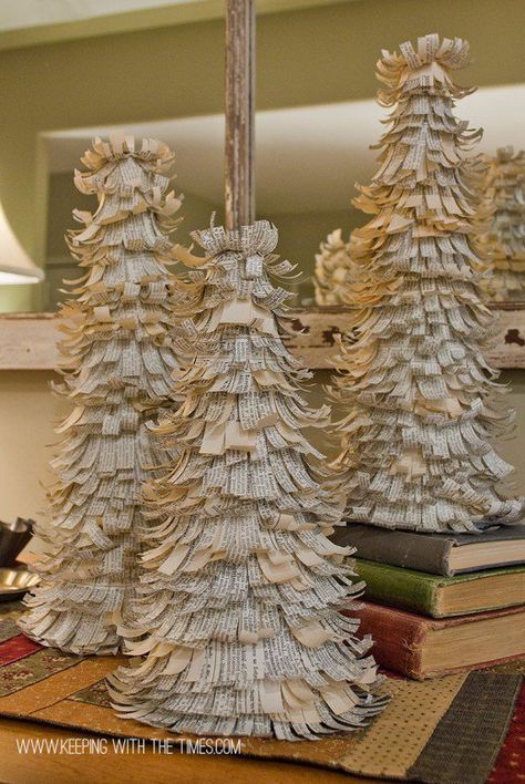 What to do with old book pages? Find 45 unique ideas when you visit Old Book Page Crafts. Project ideas such as garlands, flowers, trees and more.  Pictures and site names to the tutorials included. Recycle Books, Creativity Room, Paper Christmas Trees, Upcycled Books, Book Sculptures, Diy Paper Christmas Tree, Paper Trees, Old Book Crafts, Recycled Books