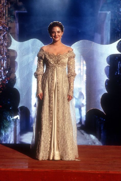 The 15 most iconic princess dresses in cinema | Vogue Paris Dresses In Movies, Angel Gowns, A Cinderella Story, Golden Dress, Romy Schneider, Most Beautiful Dresses, Catherine Deneuve, Drew Barrymore, White Gowns