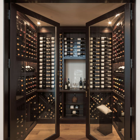 9 Decorative and Functional Wine Cellar Ideas For Your Home Wine Rooms In House Modern, Wine Cellar Ikea Hack, Wine Cellar Lighting Ideas, Modern Wine Cellar Design, Diy Wine Room, Wine Cellars Ideas, Basement Wine Cellar Ideas, Wine Room Ideas In House, Small Wine Cellar Ideas