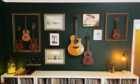 Dark Green wall
Gallery wall
Ukulele
Guitar
Trumpet
Vinyl records 
Music Room Gallery Wall With Instruments, Instrument Display Wall, Instrument Display Ideas, Music Room Gallery Wall, Guitar Gallery Wall, Gallery Wall With Guitar, Green Music Room, Instruments On Wall, Music Gallery Wall